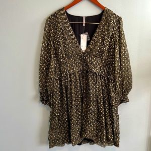 Urban Outfitters short dark olive dress with gold sparkle and sheer sleeves.